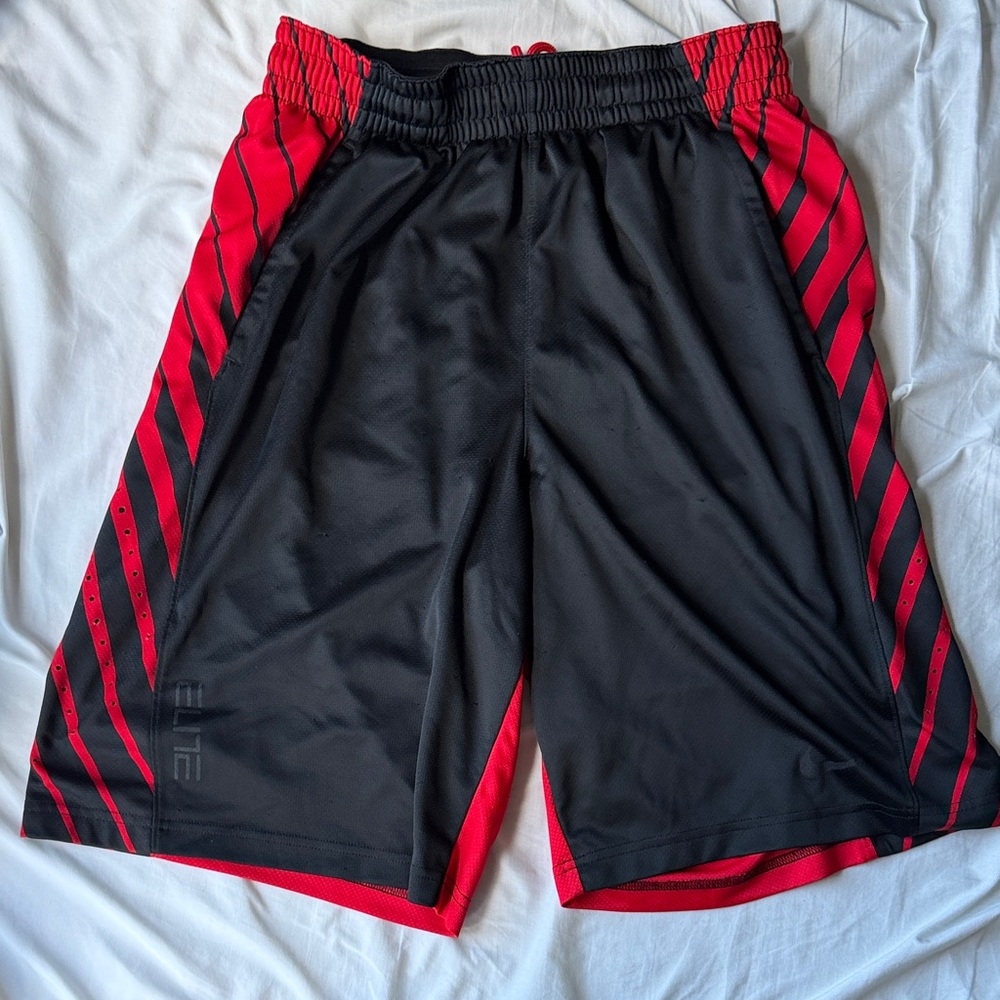 Nike Black Athletic Shorts with Red Side Panels